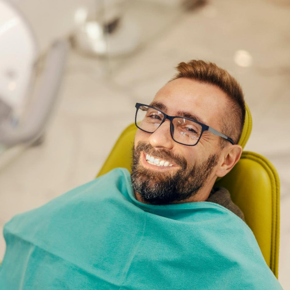 a patient undergoing in-office teeth whitening treatment