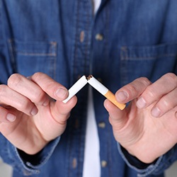 Patient breaking cigarette