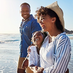 Warrenton patient enjoying walk on beach with family
