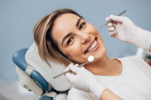Woman smiling at her dental checkup
